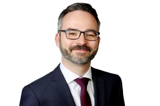 Dr.  Martin Palauneck